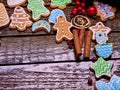 Right-hand angle of Christmas cookies on wooden table.