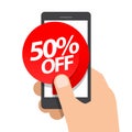 Right hand holds smartphone. fifty percent discount purchase on online