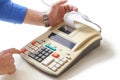 Hand presses cash register keys another takes out check Royalty Free Stock Photo