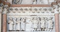 The right portal of the Cathedral of St Martin in Lucca. Lunette dedicated to the life of St Regulus, Lucca, Italy Royalty Free Stock Photo