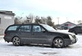 Old veteran classic very dirty black hatchback car Mercedes Benz parked