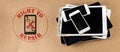 right to repair symbol next to broken tablets and smart phones on board consumer right to repair goods