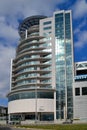 The right tower of the Varna Towers - modern business, shopping and entertainment center on a sunny day against a blue sky with cl