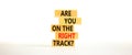 Right track symbol. Concept words Are you on the right track on wooden blocks on a beautiful white table white background. Copy