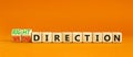 Right or wrong direction symbol. Concept words Right direction Wrong direction on wooden blocks. Beautiful orange table orange