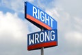 Right and wrong - street sign, sky in background Royalty Free Stock Photo