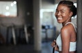 Righting all wrongs. Portrait of a young beautiful woman taking a break from her workout in the gym.