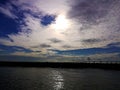 Rigolets Bridge sky water clouds sun Louisiana marsh Royalty Free Stock Photo