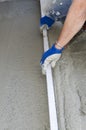 Rigone to smooth the concrete