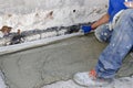 Rigone to smooth the concrete