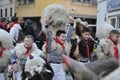 Rijeka, Croatia,19.02.2023. Ringer bells, traditional masked group of children and adults covered by sheepskin and animal masks.