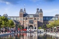 Rijksmuseum Amsterdam with a reflection in a pont Royalty Free Stock Photo