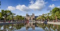 Rijksmuseum Amsterdam with a reflection in a pont