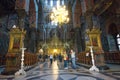 Interior with tourists and faithful in the church at the Rila monasterys and UNESCO site in Bulgaria