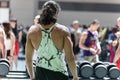 Boy in the Gym Ready to use Dumbbells in a White Tank Top that highlights his Shoulders Royalty Free Stock Photo