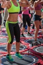 Rimini, Italy - june 2017: Mini Trampoline Workout: Girls doing Fitness Exercise in Outdoor Class at Gym Royalty Free Stock Photo