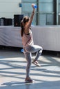 Rimini, Italy - may 2019: People Exercising with Plastic Water Bottle in Class at Gym with Music and Teacher on Stage