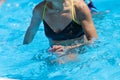 Rimini, Italy - may 2019: Woman Doing Water Aerobics Outdoor in a Swimming Pool Royalty Free Stock Photo