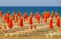 Rimini - Orange umbrellas and sunbeds