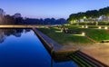 Rimini sunset view of city park with evening lights. Modern and ancient architecture