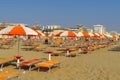 Rimini - White-orange umbrellas and sunbeds