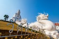 Rimkok district,Chiang Rai Province,Northern Thailand on January 19,2020:Enormous white Guan Yin Statue and beautiful dragon