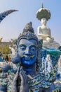 Rimkok district,Chiang Rai Province,Northern Thailand on January 19,2020:The fountain,white Buddha statue and angellic guardians