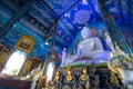 Rimkok district,Chiang Rai Province,Northern Thailand on January 19,2020:Large white Buddha image in subduing Mara at Wat Rong