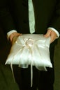 Ring Bearer holds Pillow at Wedding Royalty Free Stock Photo
