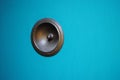 Ring bell on a turquoise wall surface