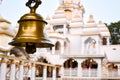 Ring bells in temple. Golden metal bell isolated. Big brass Buddhist bell of Japanese temple. Ringing bell in temple is belief Royalty Free Stock Photo