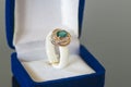Ring with a blue stone in box Royalty Free Stock Photo