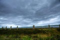 The Ring of Brodgar in Orkney with dramatic sky