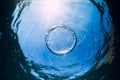 Ring bubble underwater and sun light in ocean. Water texture Royalty Free Stock Photo