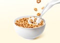 Ring cereals with pouring milk Royalty Free Stock Photo