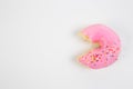 Ring doughnut fresh from the bakery with sprinkle sweets and icing on top Royalty Free Stock Photo