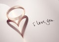 Ring with heart shaped shadow Royalty Free Stock Photo