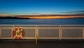 Ring life boy on big boat.Obligatory ship equipment.Personal flotation device. Orange lifesaver on the deck of a ship