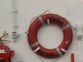 Ring life buoys on white boat.