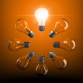 Ring of light bulbs with one lit up Royalty Free Stock Photo