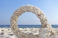 Ring of old rope on a seashore