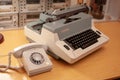 Ring phone and old type writer Royalty Free Stock Photo