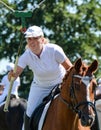 Ring riding - young woman focused on target