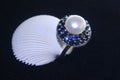 24 Ring, Silver, Natural Pearl, Sapphires Exclusive jewels Royalty Free Stock Photo