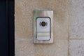 Ring surveillance video on modern house with contemporary doorbell near door