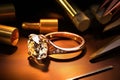 ring with unset diamond next to jewelers tools