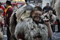 Rijeka, Croatia,19.02.2023. Ringer bells, traditional masked group of children and adults covered by sheepskin and animal masks.