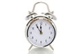 Ringing alarm clock, time set to five minutes to twelve Royalty Free Stock Photo