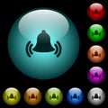 Ringing bell icons in color illuminated glass buttons