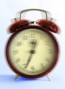 Ringing old style alarm clock (movement blur)